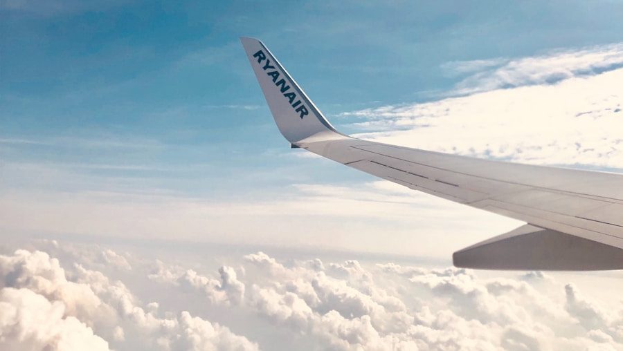 a view of the wing of an airplane in the sky