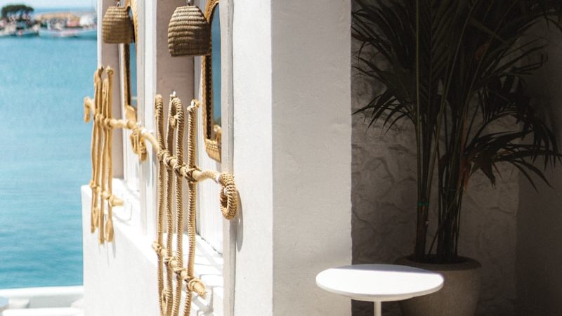 a white building with a large mirror