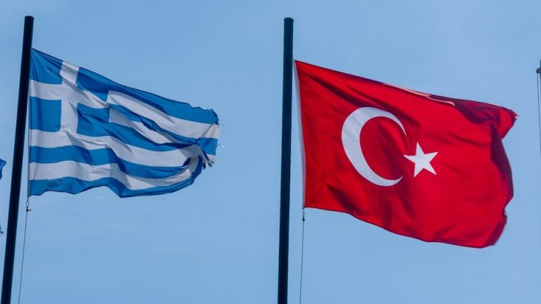 Flags of kosovo, greece, turkey, and usa waving