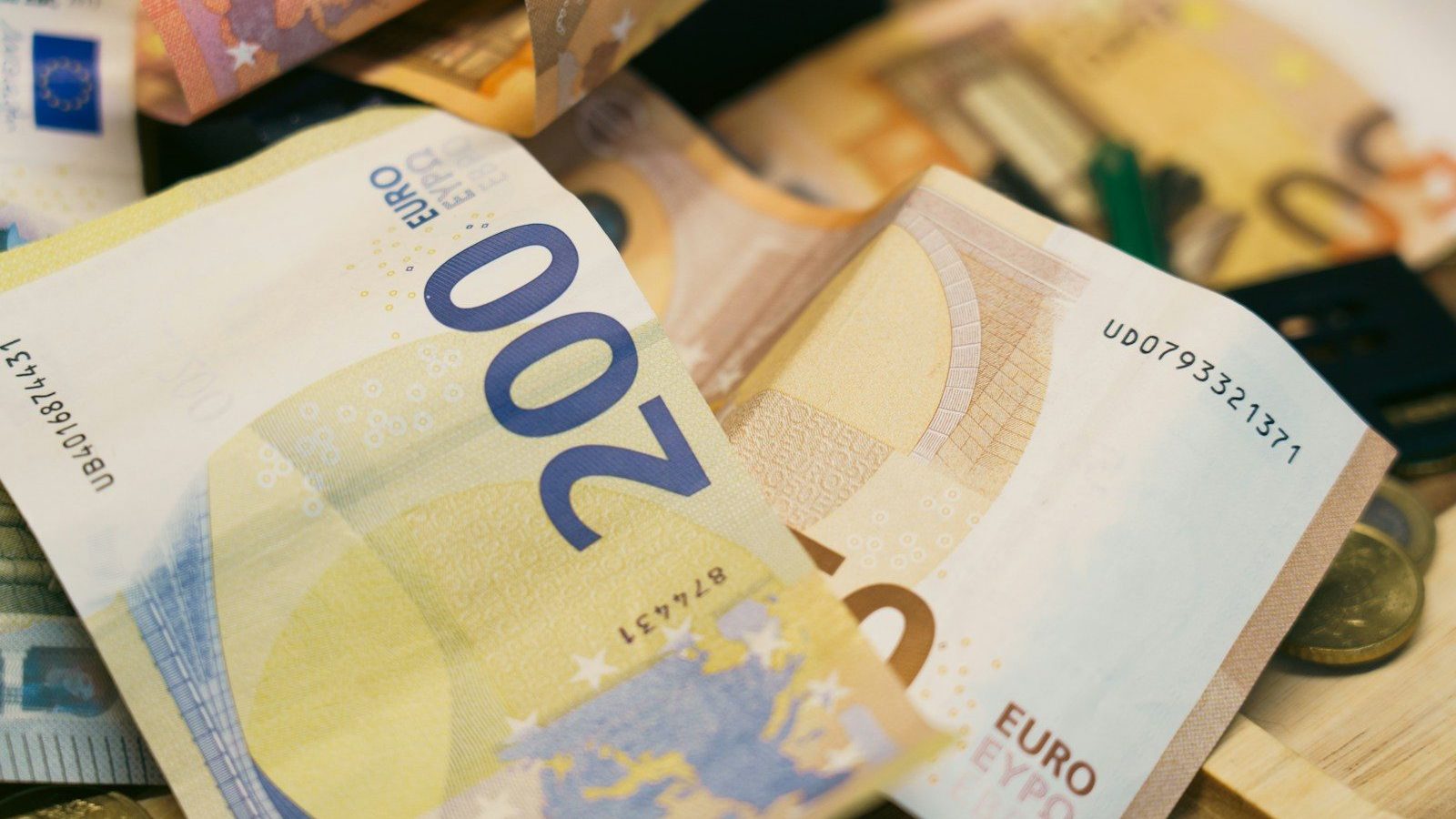 There is a pile of euro banknotes.